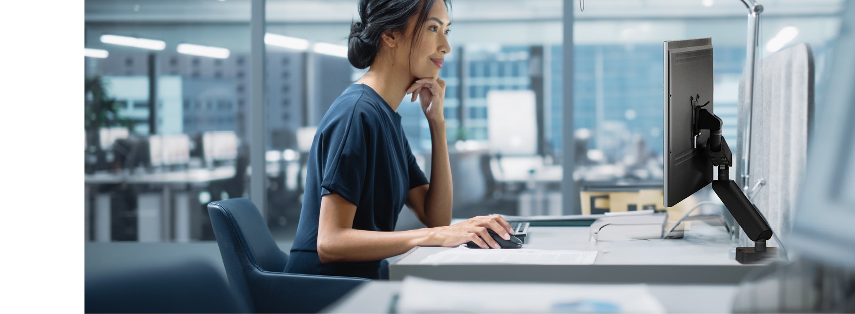 In Big Diverse Corporate Office: Portrait of Beautiful Asian Manager Using Desktop Computer, Businesswoman Managing Company Operations, Analysing Statistics, Commerce Data, Marketing Plans.