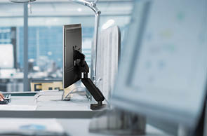 In Big Diverse Corporate Office: Portrait of Beautiful Asian Manager Using Desktop Computer, Businesswoman Managing Company Operations, Analysing Statistics, Commerce Data, Marketing Plans.